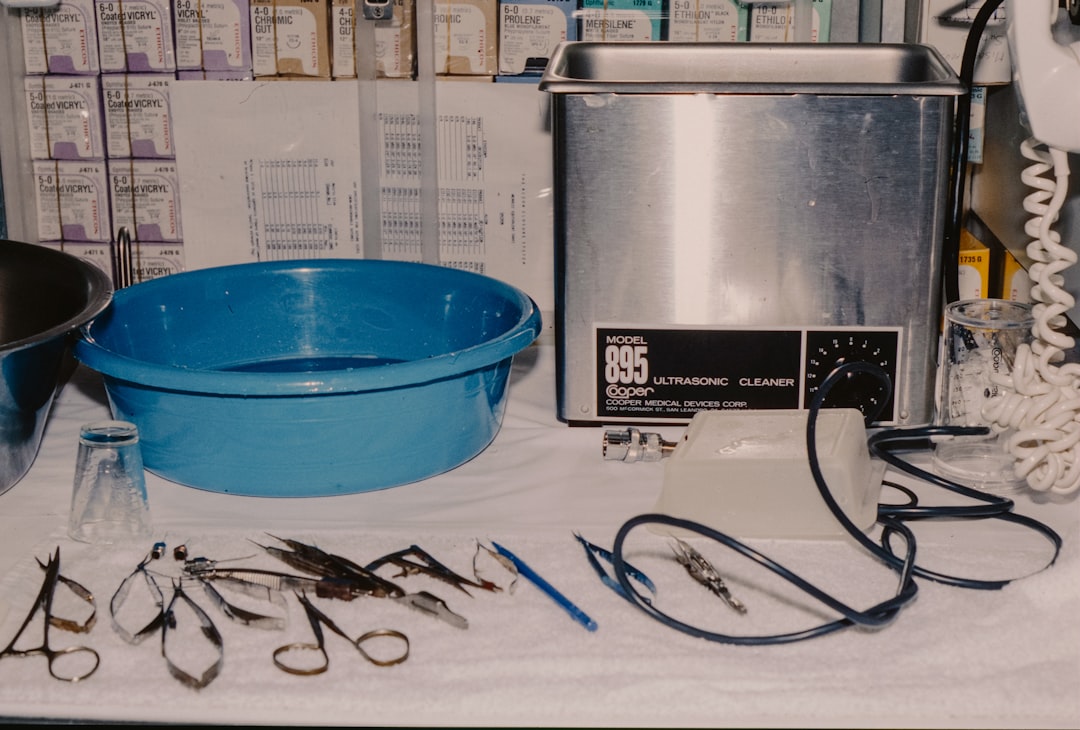 surgical-instruments-and-cleaning-equipment-on-a-table-adhy6hs4sis